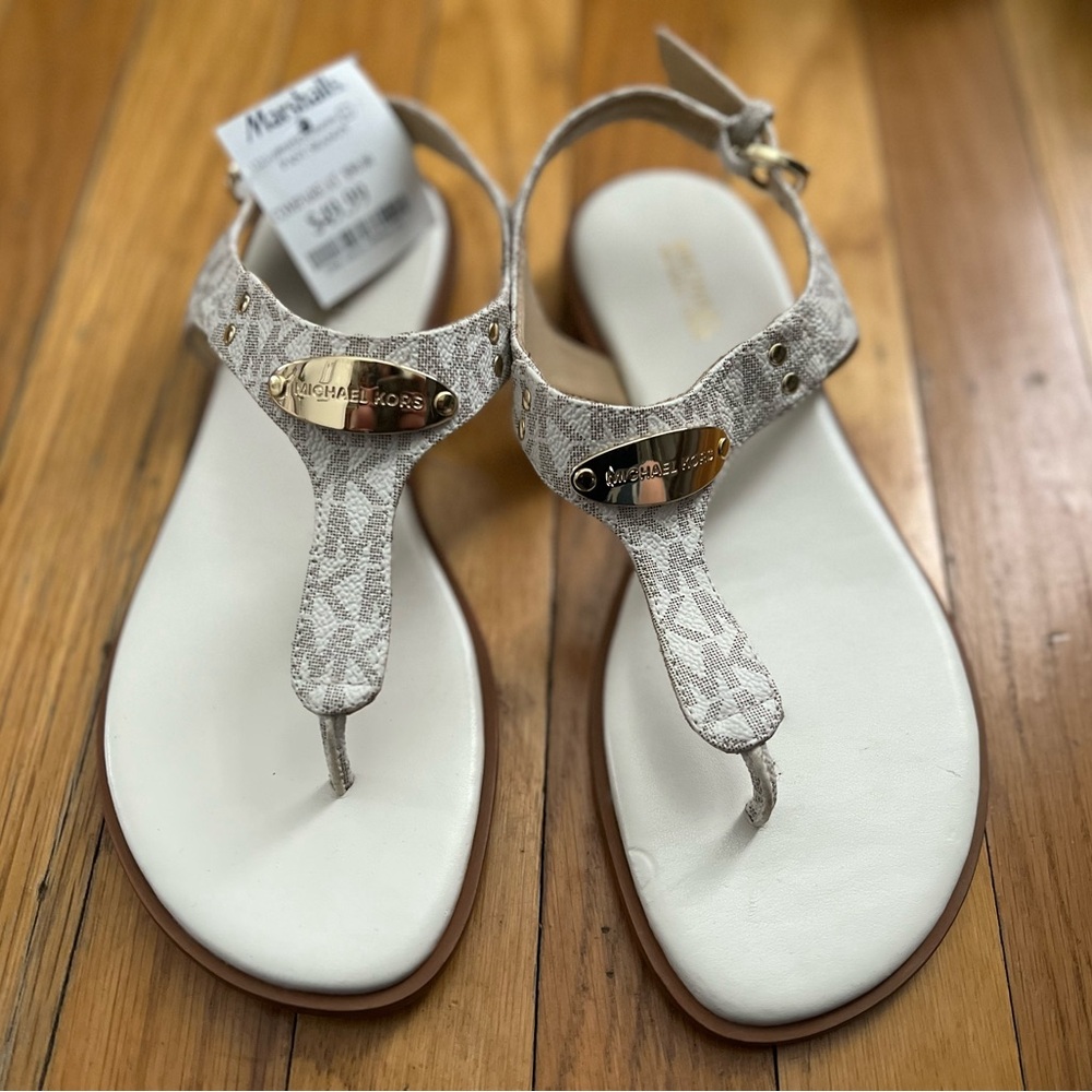 Size 6 Brand new Michael Kors sandals. NWT